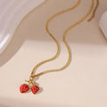 Stainless steel strawberry fruit pendant necklace with white powder gradient finish and red charm