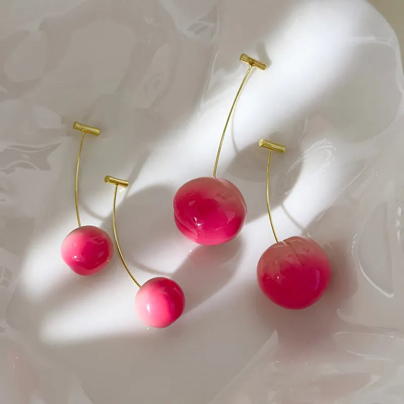 Transparent acrylic peach earrings with copper wires in small and large size options