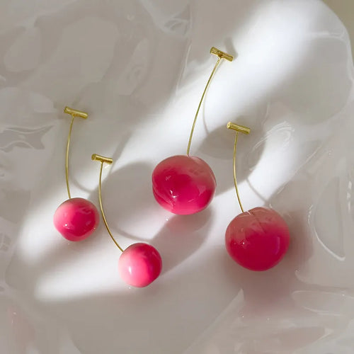 Transparent acrylic peach earrings with copper wires in small and large size options