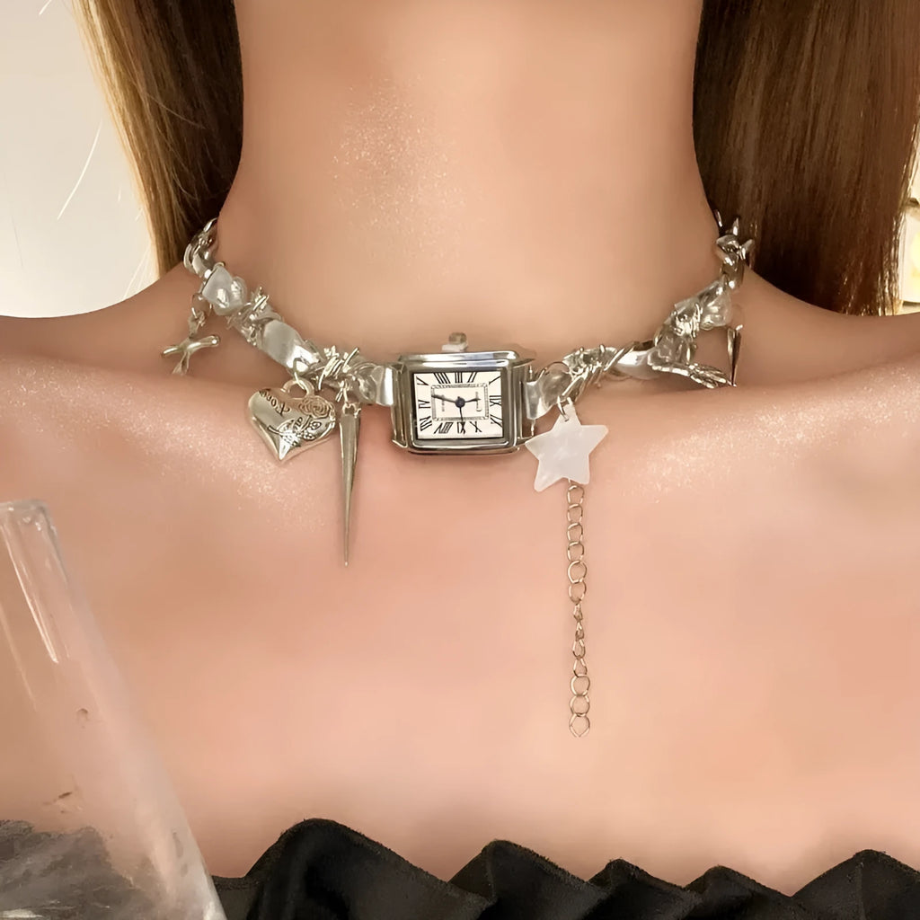 Dark multi-layer necklace with hemp flower chain links and a cross pendant on an adjustable 41-50cm chain.