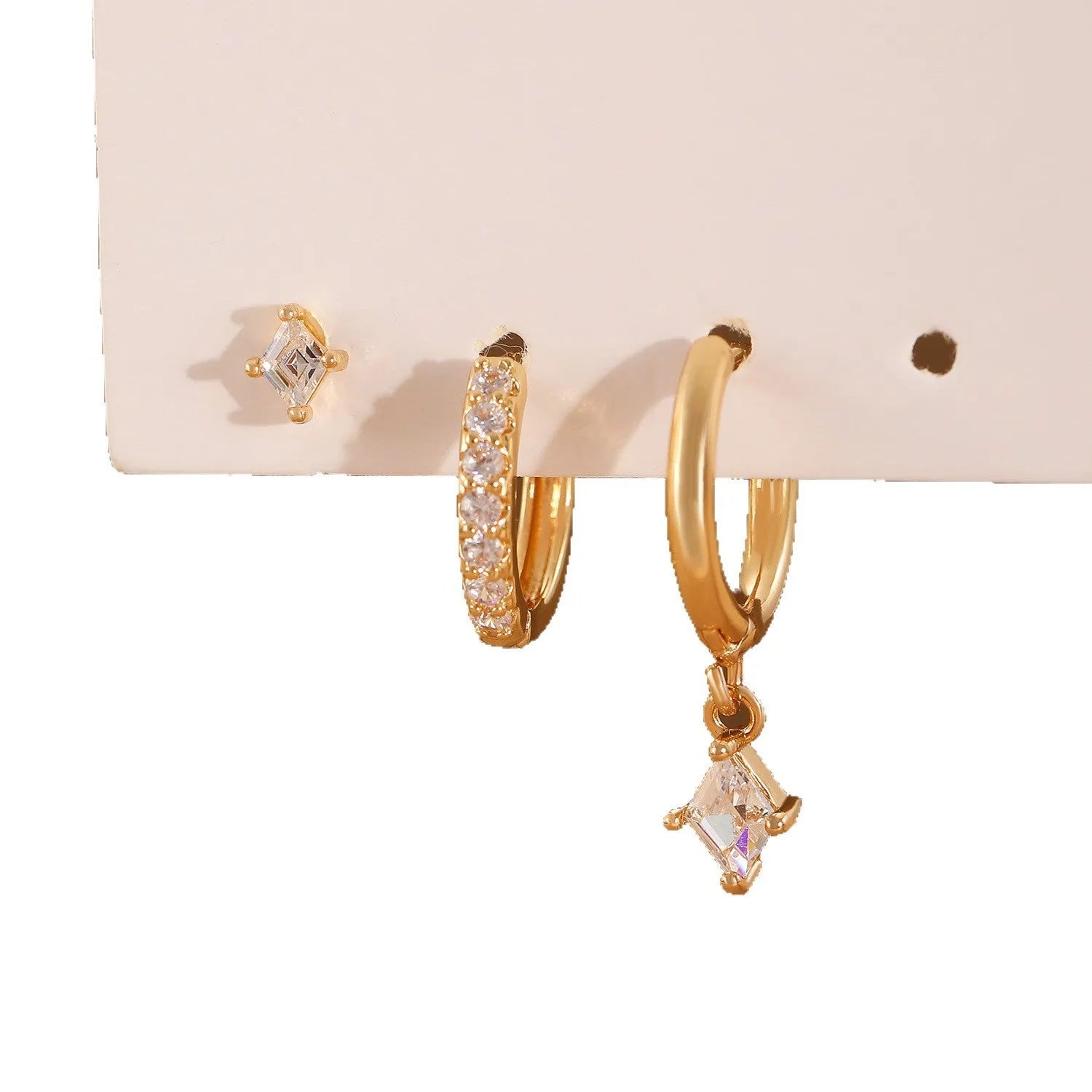 Ladies three-piece geometric earring set with zircon stones in gold and white finish options