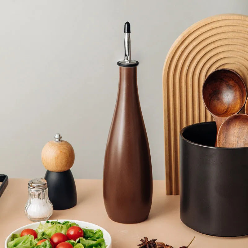 Ceramic kitchen oil pot with sealed lid and funnel in black, white, or coffee colour.