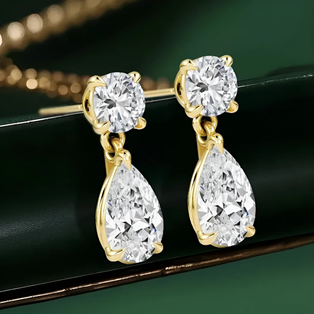 Water drop moissanite stud earrings in 925 sterling silver with round and geometric shapes