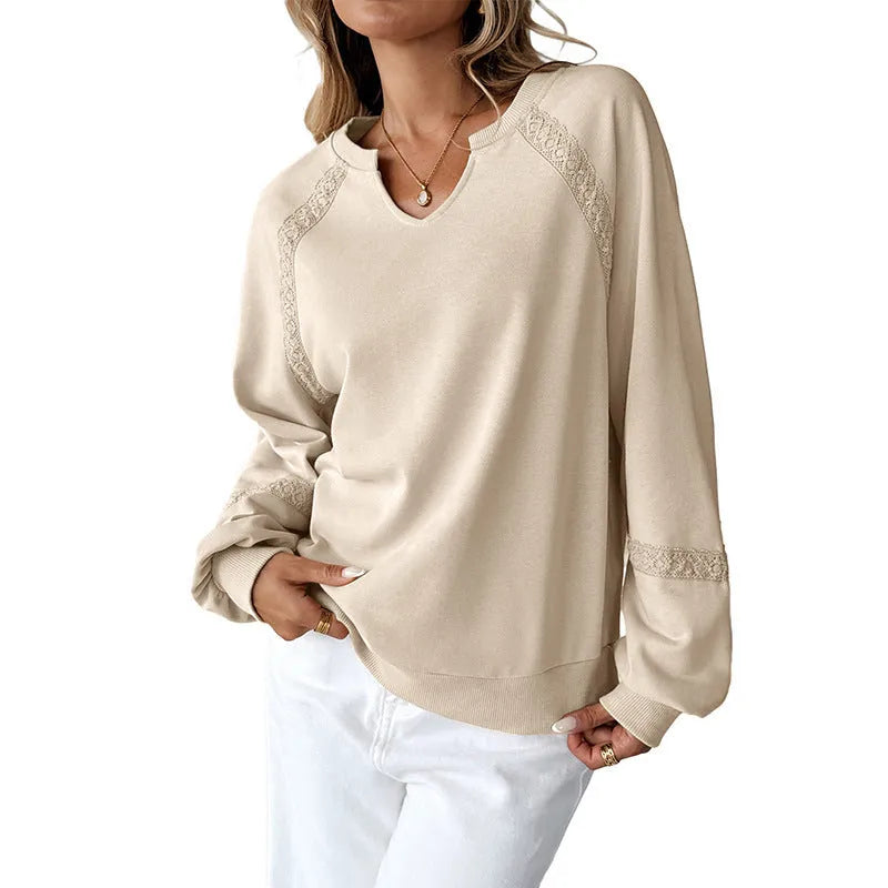 Women's loose fit long sleeve sweater with half-open lace collar in solid colour options.