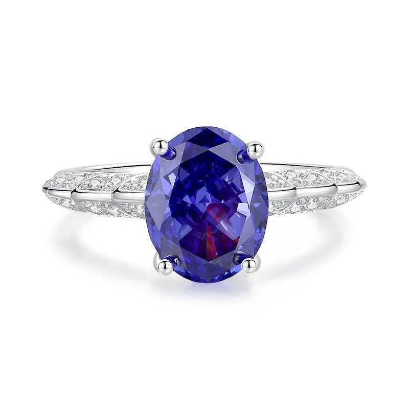 Heart-shaped high carbon diamond ice flower cut colour zircon stone set in a women's 925 sterling silver ring.