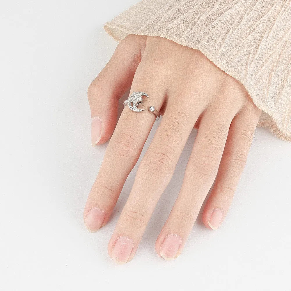 Micro-inlaid free rotating zircon star moon anti-anxiety ring in gold on white background