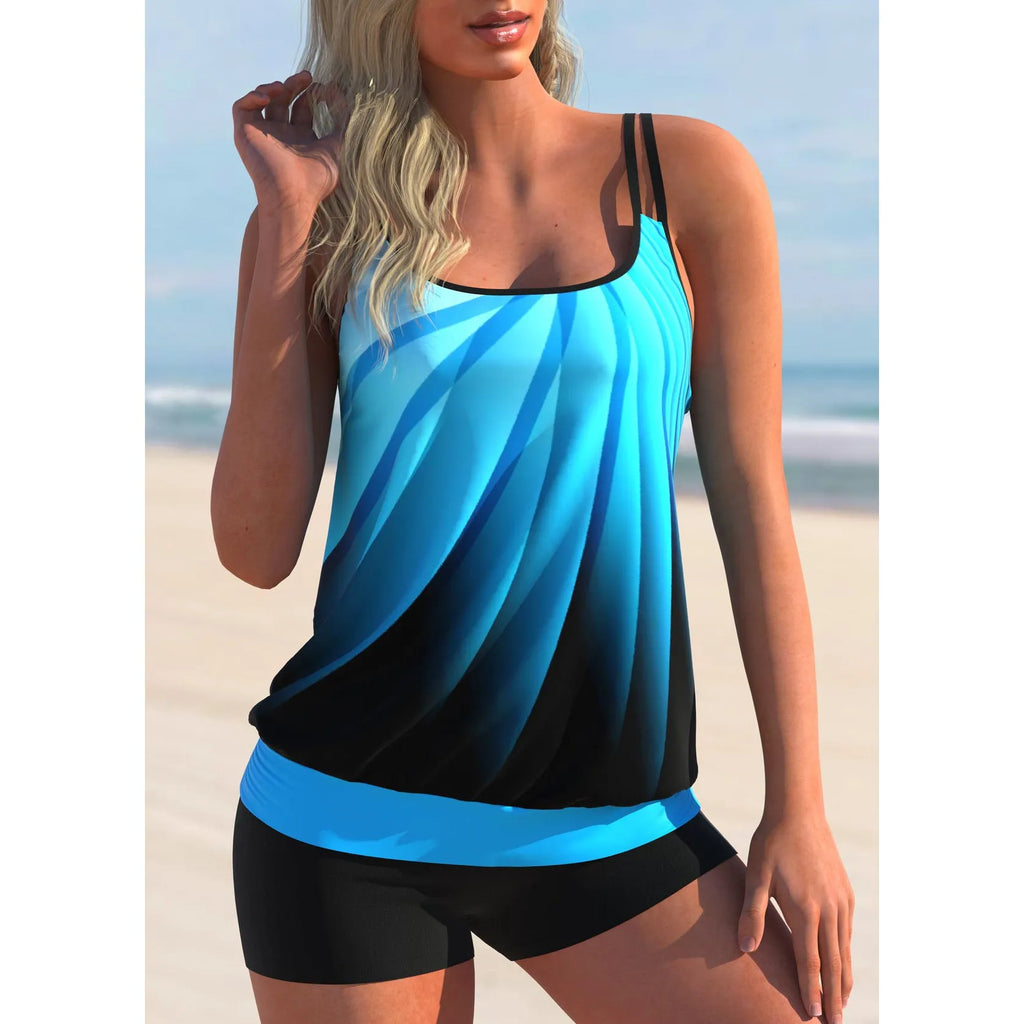 Women's plus size printed swimsuit set with strap top and matching beach shorts on a hanger.