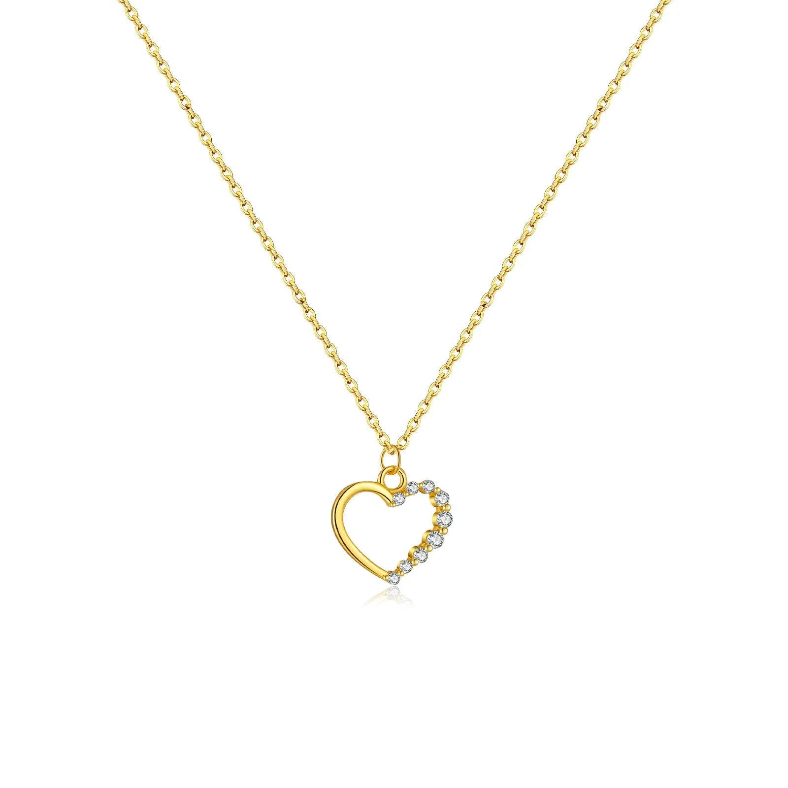 Sterling silver hollow heart necklace with circular details on a regular chain