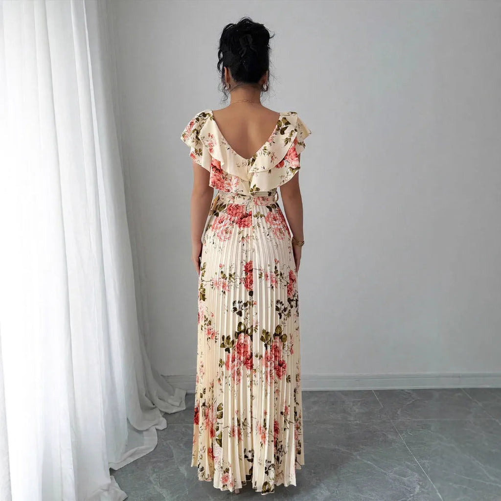 Apricot floral print dress with V-neck, ruffled sleeves, and pleated swing skirt