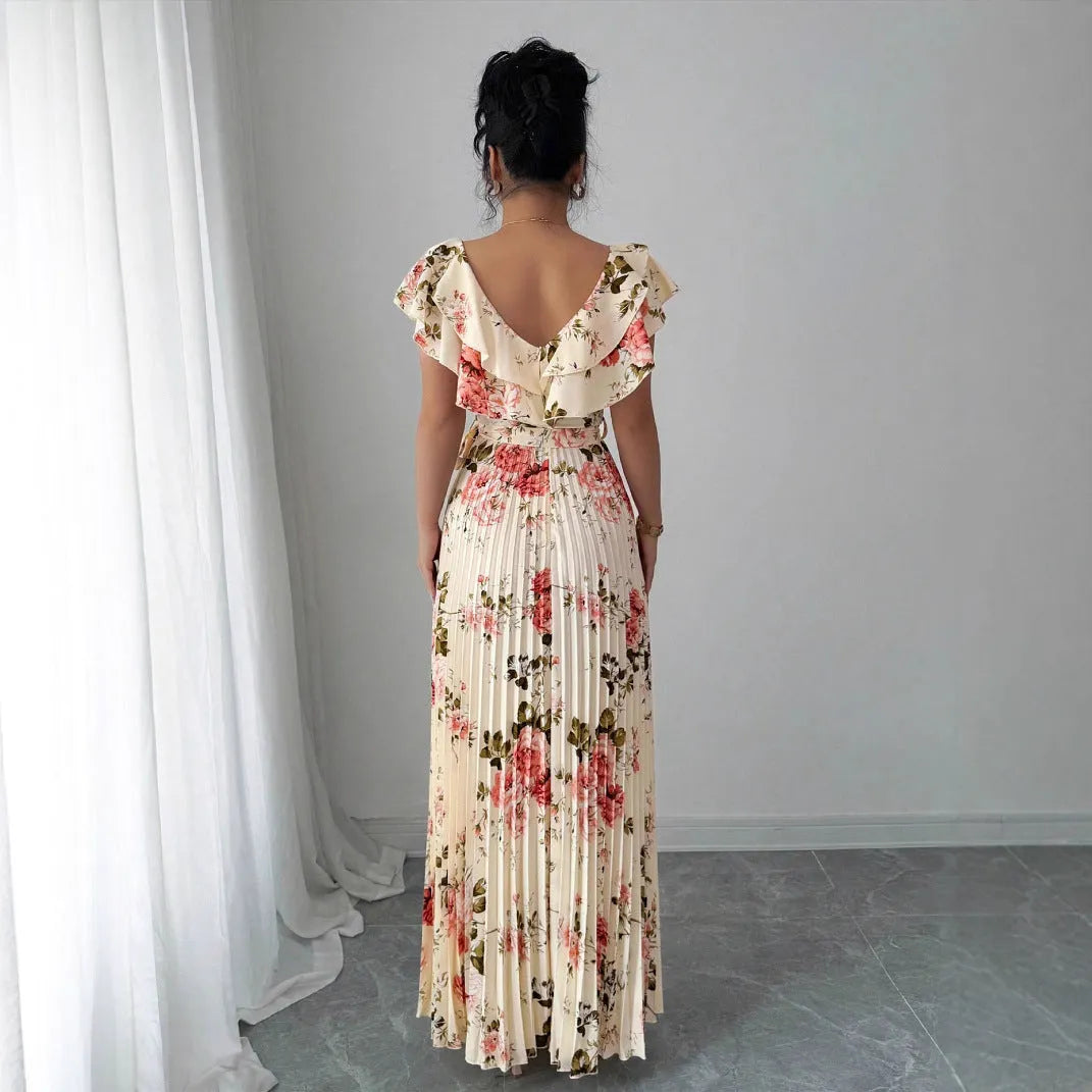 Apricot floral print dress with V-neck, ruffled sleeves, and pleated swing skirt