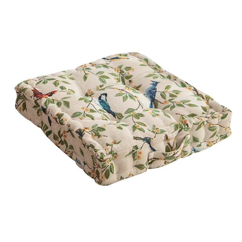American-style square dining chair cushion for back support in apricot floral pattern.