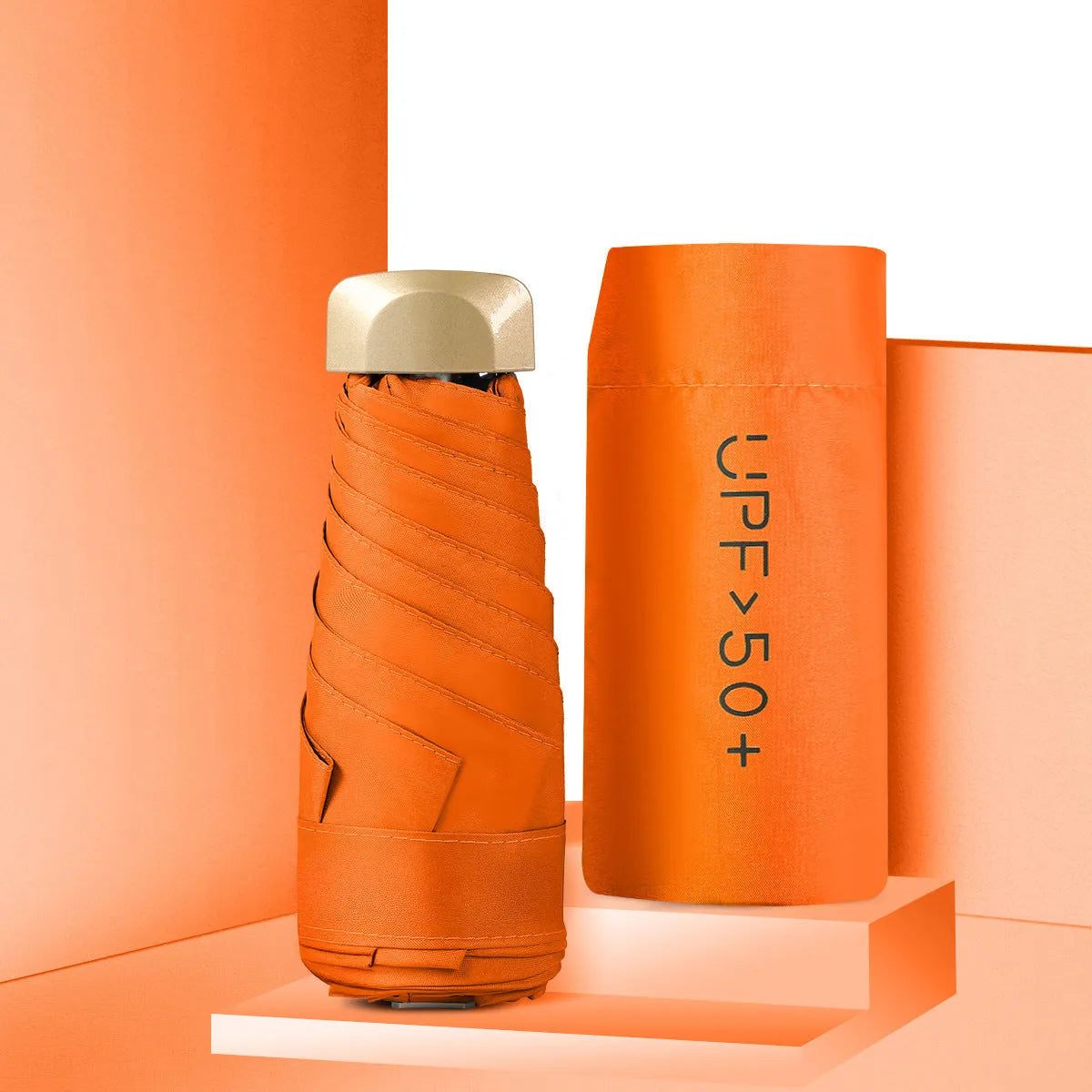 Closed five-fold mini pocket sun umbrella with alloy frame and rubber handle, shown in a selection of available colours.