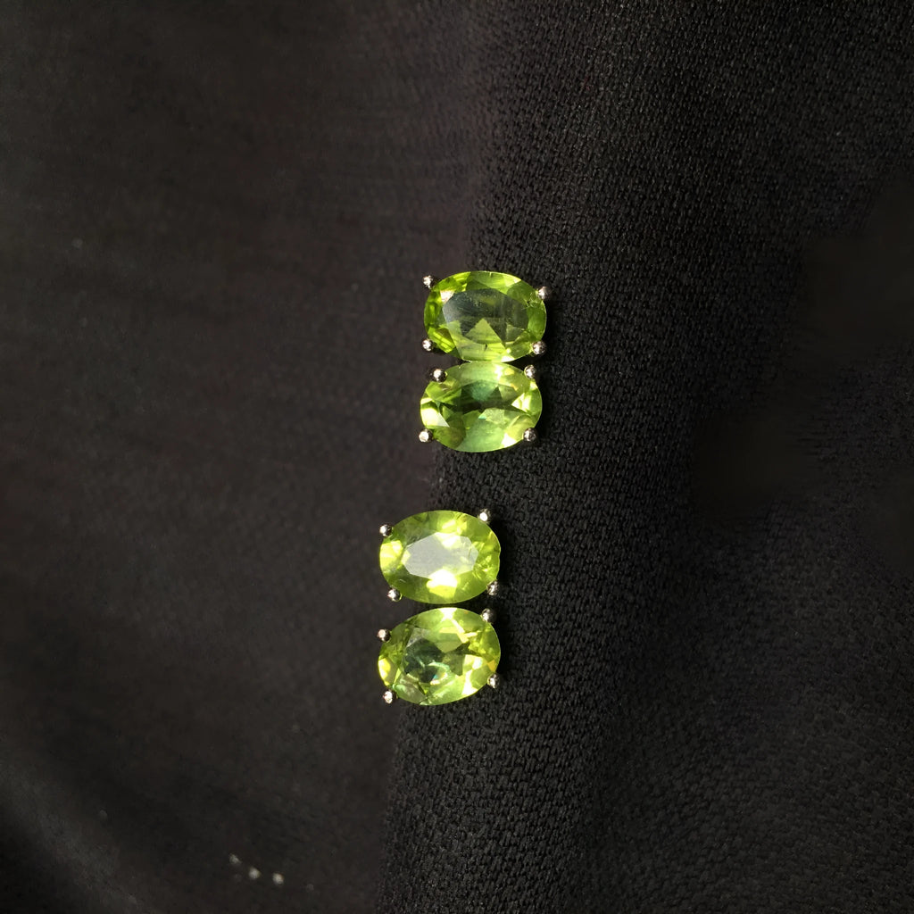 Grass green natural olivine stud earrings in S925 sterling silver setting.