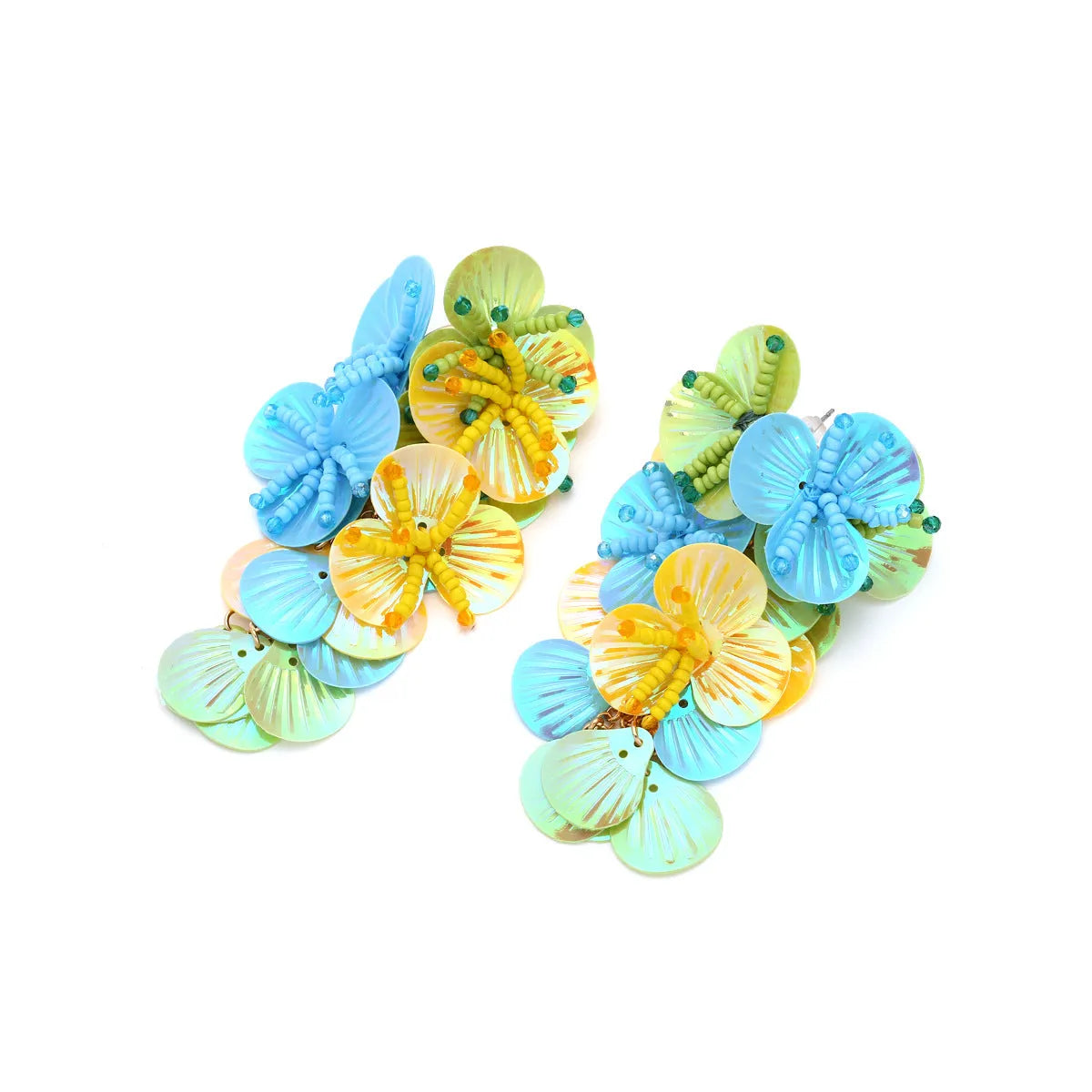Handmade colourful beaded flower and leaf earrings in exaggerated dopamine style.