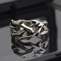 Copper geometric thorn flower ring with adjustable opening on finger
