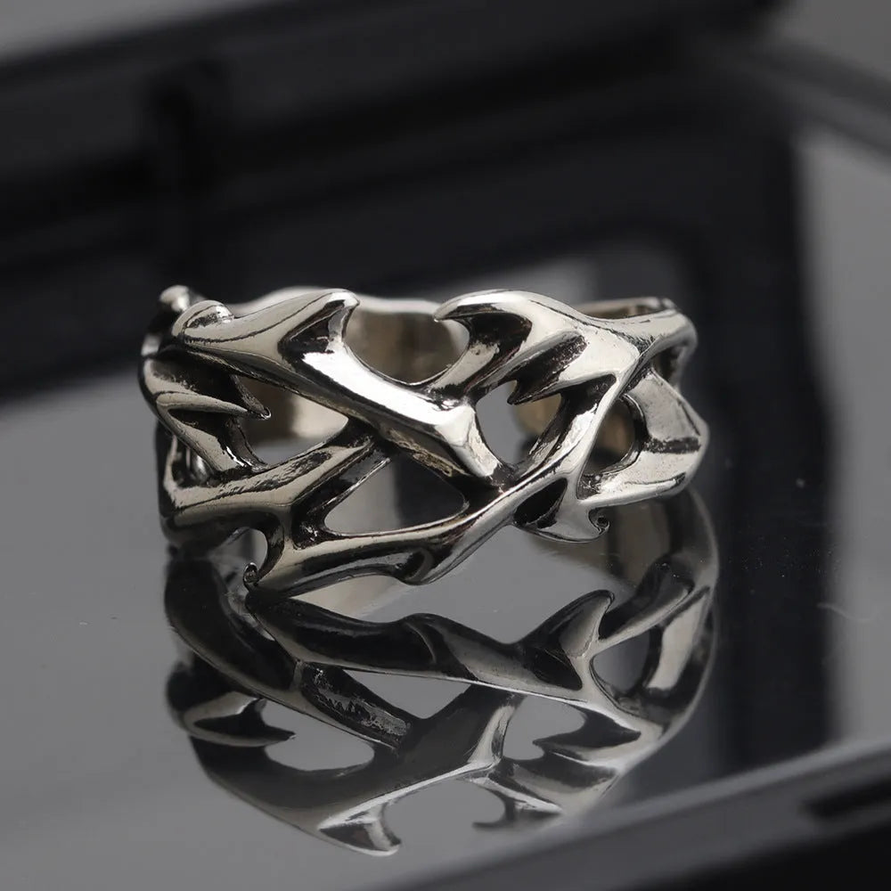 Copper geometric thorn flower ring with adjustable opening on finger