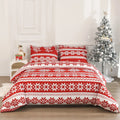 Red Christmas Love Song pattern duvet cover and pillowcases on a bed.