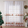 A pair of white polyester curtains with embroidered red and green snowflakes, showing American Christmas style.