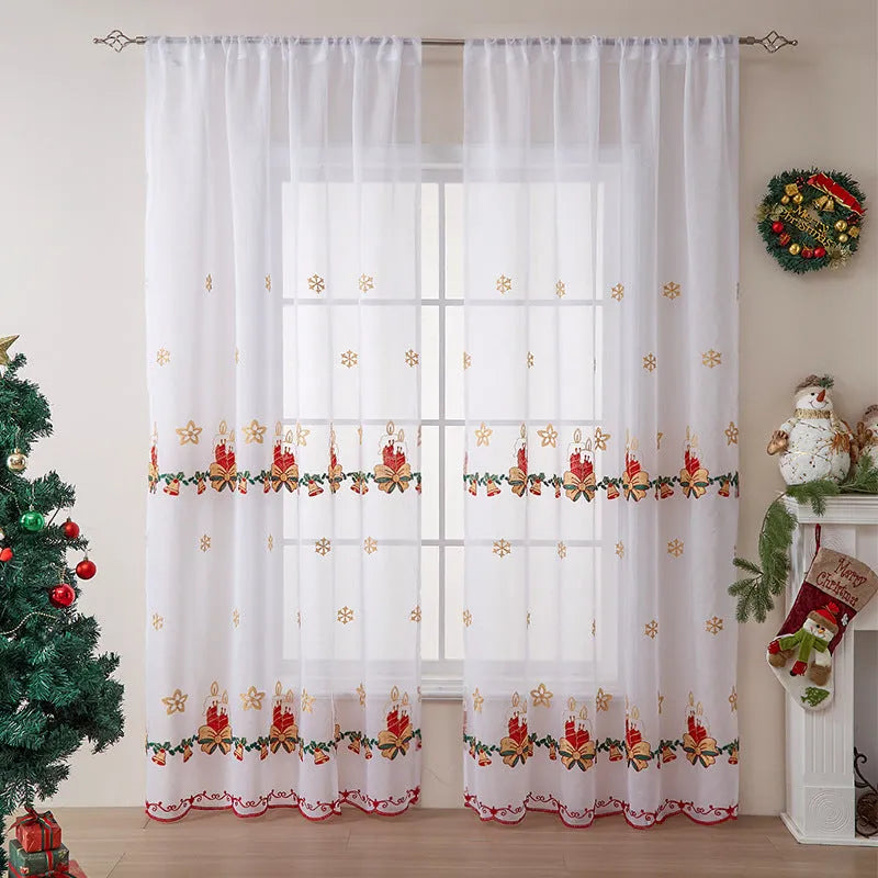 A pair of white polyester curtains with embroidered red and green snowflakes, showing American Christmas style.