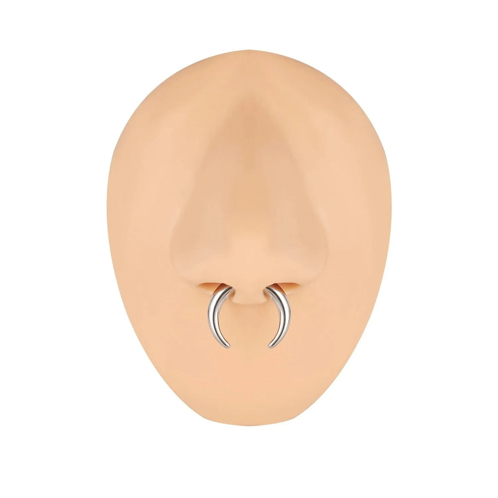 316L steel C-shaped nose ring in black and steel colour on a plain background, showing geometric shape.