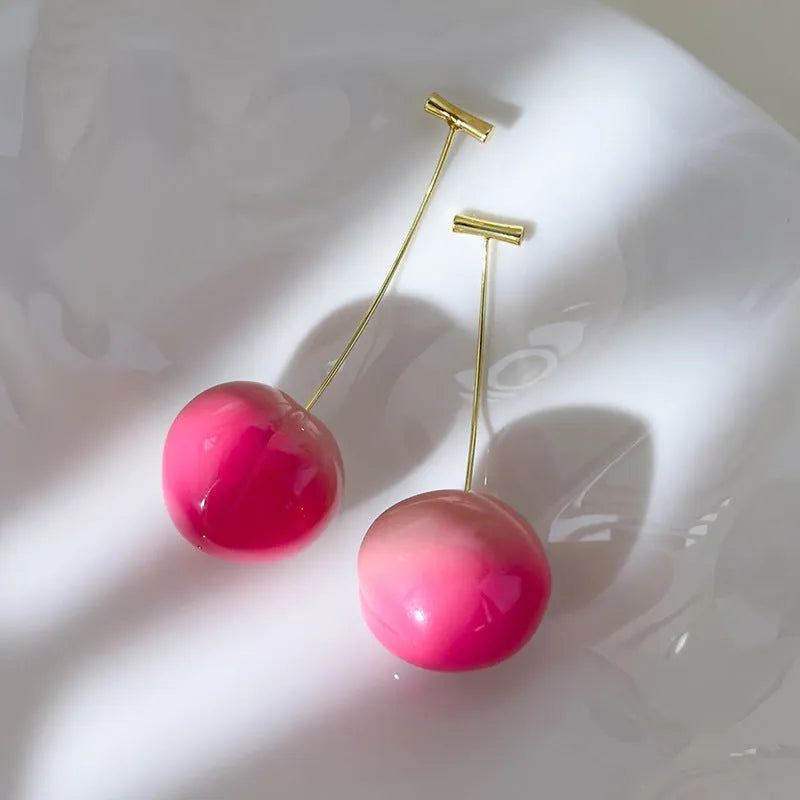Transparent acrylic peach earrings with copper wires in small and large size options