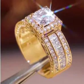 Geometric silver fashion ring for women in gold or white electroplated alloy, showing round design elements.