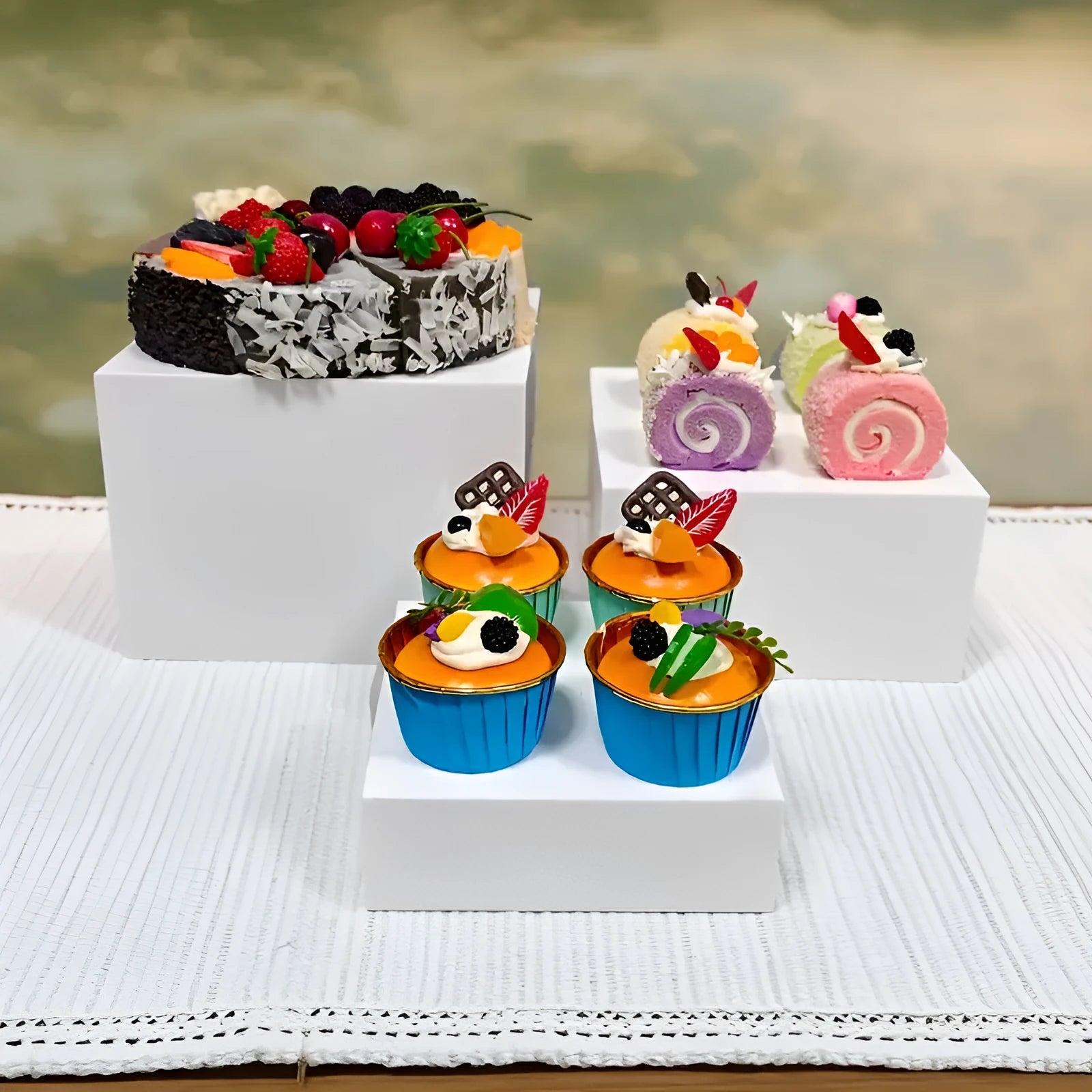 White plastic six-piece suit cube desktop dessert display stand set arranged in tiers.