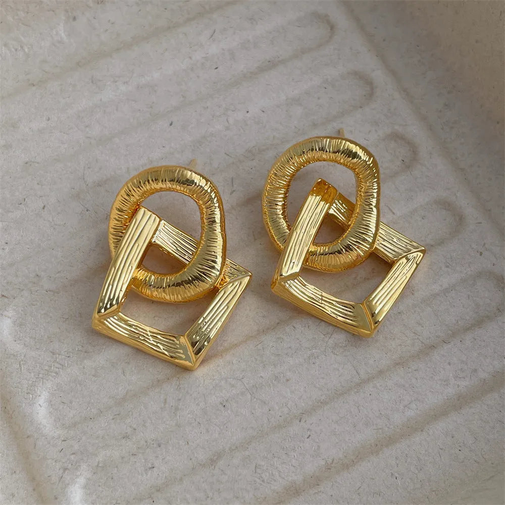 Retro circle pendant earrings in gold or silver electroplated copper with 3.4cm geometric drop design