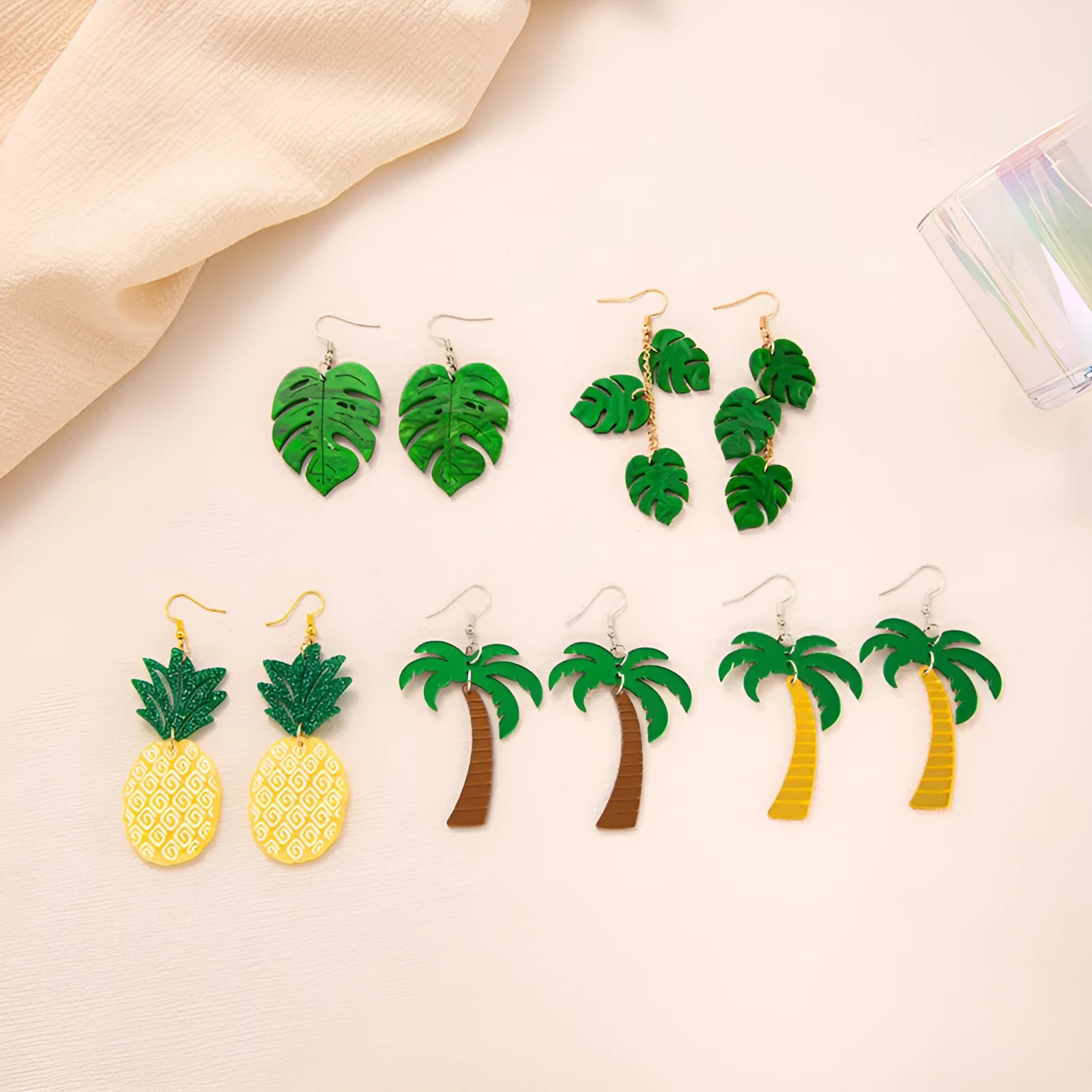 Acrylic drop-shaped personality style earrings with ear hooks in one of five colour variations.