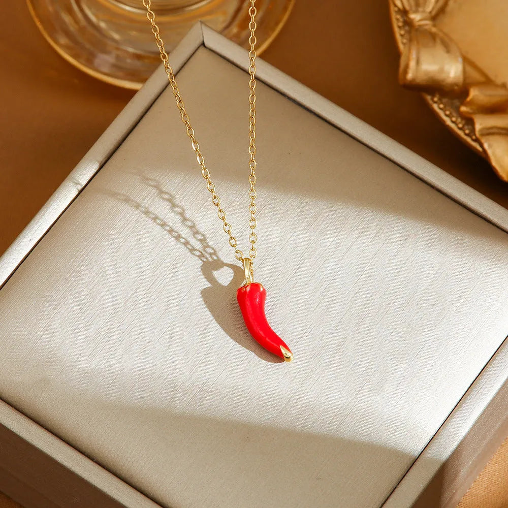 Women's titanium steel necklace with delicate indie pendant designs including strawberry, cherry, and pepper motifs