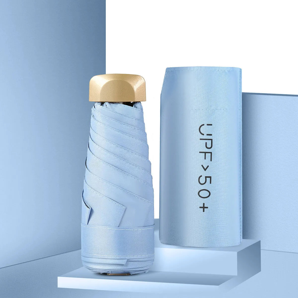 Closed five-fold mini pocket sun umbrella with alloy frame and rubber handle, shown in a selection of available colours.