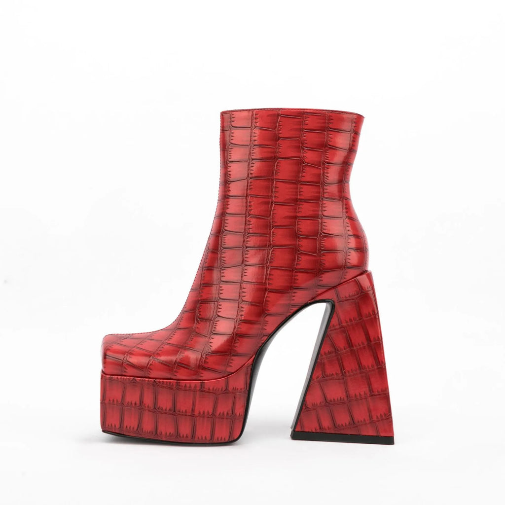 Women's solid-colour ankle boots with a high heel, shown in beige.