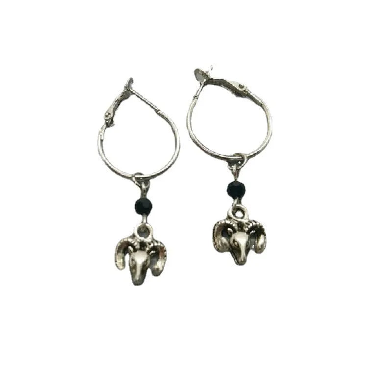Silver round ring earrings with Tibetan antelope design on circular alloy frames