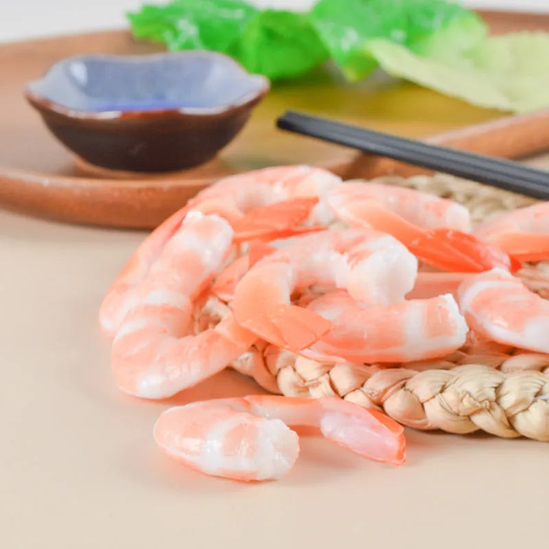 Realistic PVC shrimp-shaped keychain with door buckle attachment, shown against a white background.