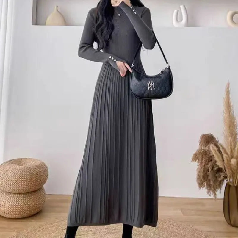 Women's beige knit A-line mid-length skirt with high waist trimming, shown front view.