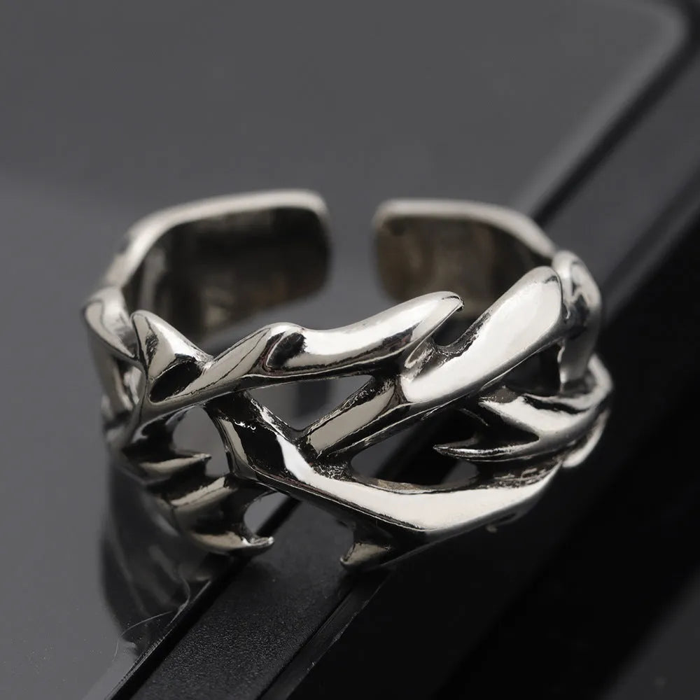Copper geometric thorn flower ring with adjustable opening on finger