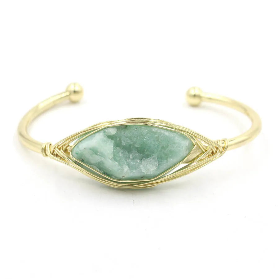 Natural raw gemstone bracelet with 8mm amorphous crystal beads on an adjustable open band.