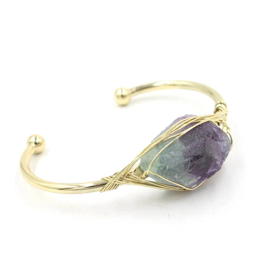 Natural raw gemstone bracelet with 8mm amorphous crystal beads on an adjustable open band.