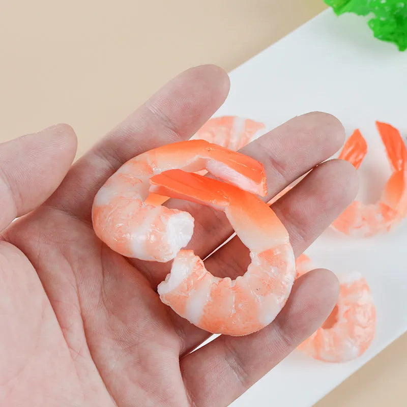 Realistic PVC shrimp-shaped keychain with door buckle attachment, shown against a white background.