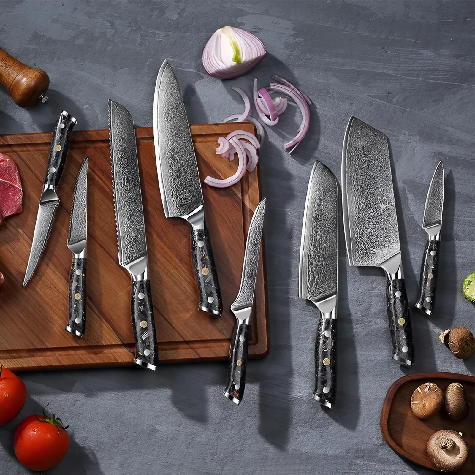 Damascus steel eight-piece kitchen knife set showing fishbone pattern blades and modern handles.