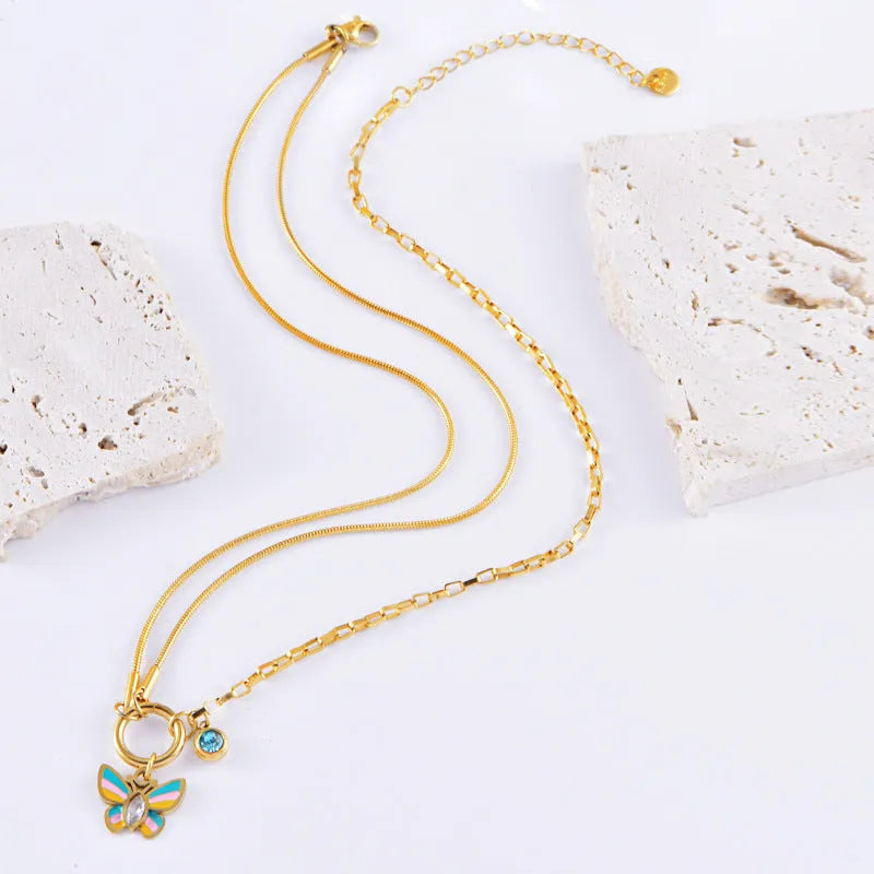 Gold titanium steel butterfly necklace and bracelet set with snake bone chain styling