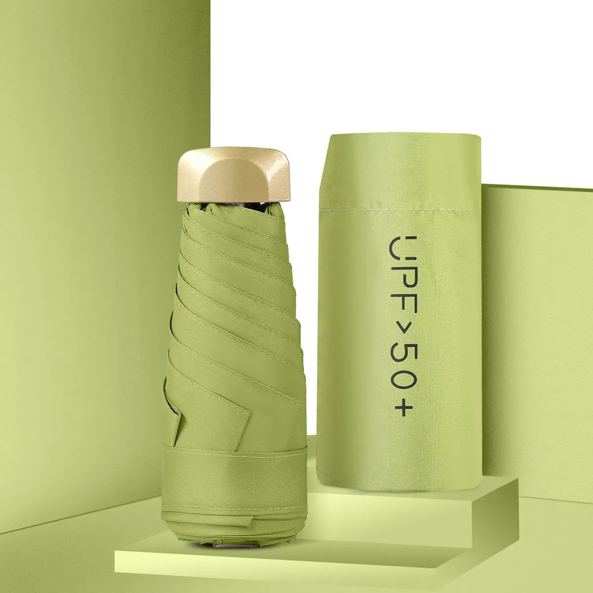 Closed five-fold mini pocket sun umbrella with alloy frame and rubber handle, shown in a selection of available colours.