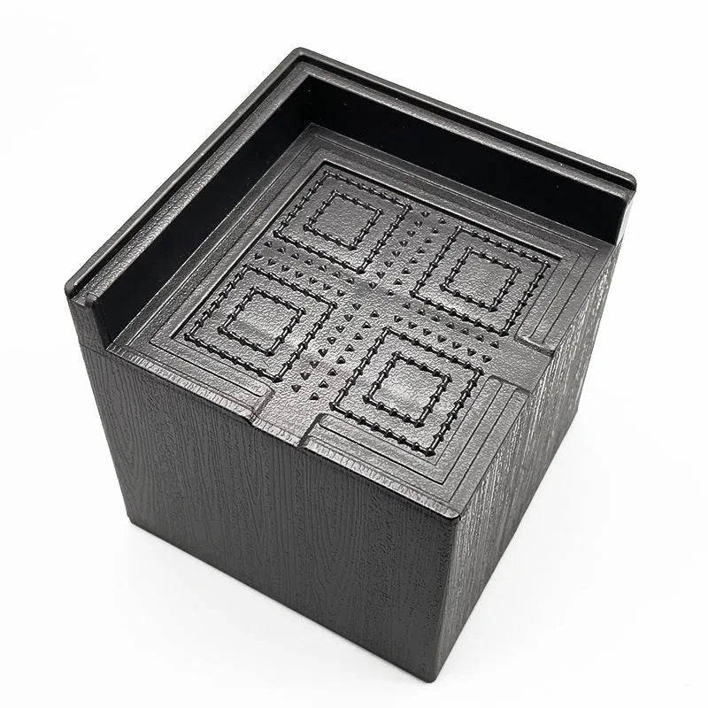 Four black thickened plastic furniture feet mats for height adjustment