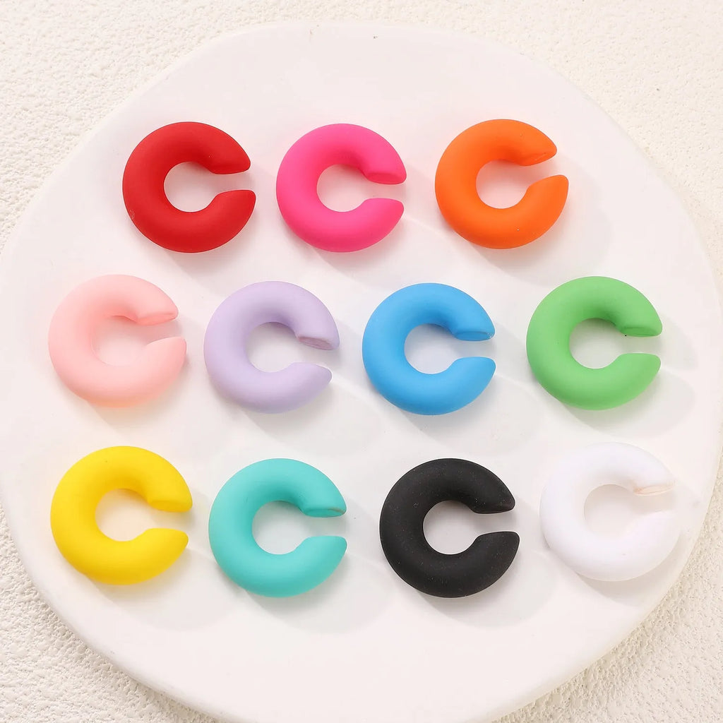 C-shaped matte coarse round clip-on earrings in a choice of 15 candy colours for women.