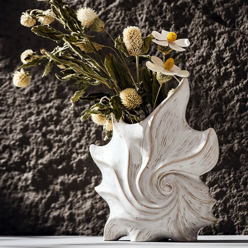 Hexagon-shaped ceramic vase with a coloured glaze finish in a retro creative European style.