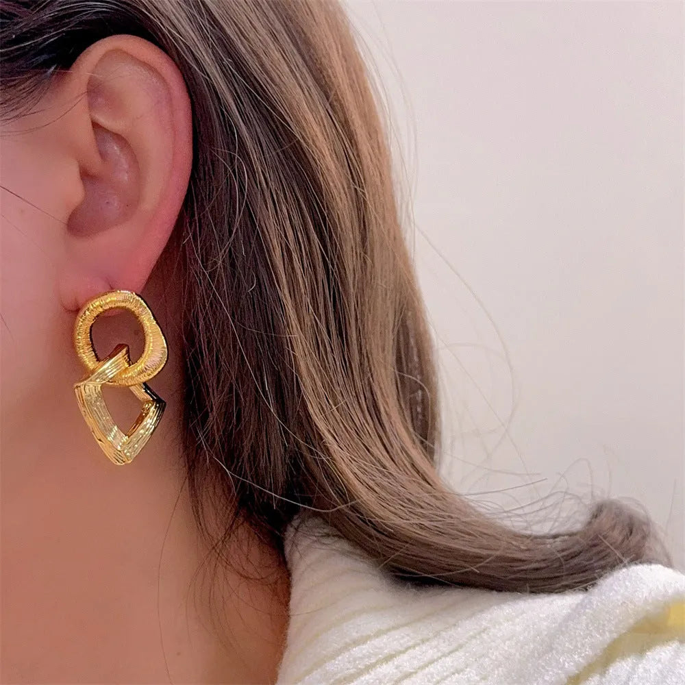 Retro circle pendant earrings in gold or silver electroplated copper with 3.4cm geometric drop design