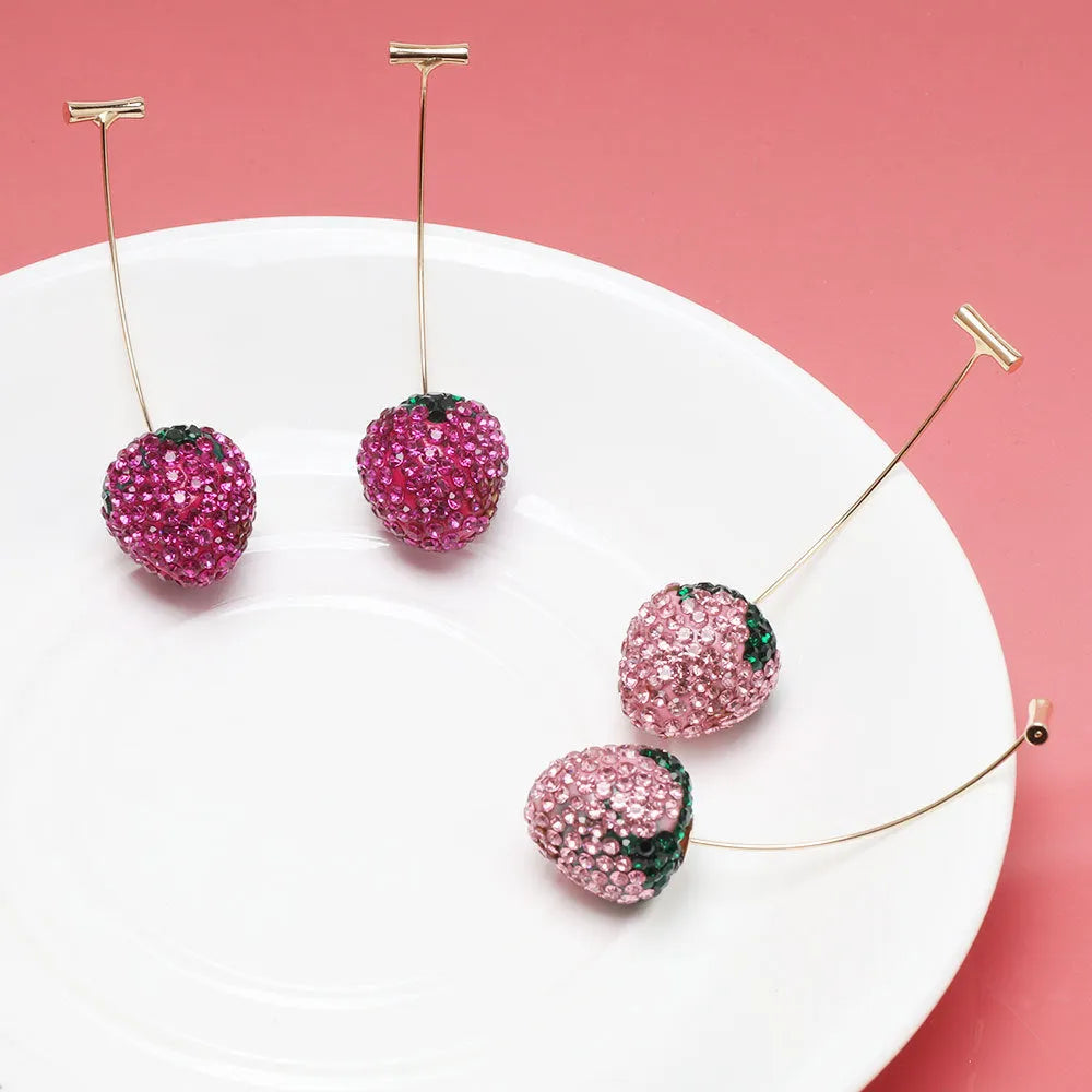 Red geometric strawberry earrings with spot drill detailing on zinc alloy