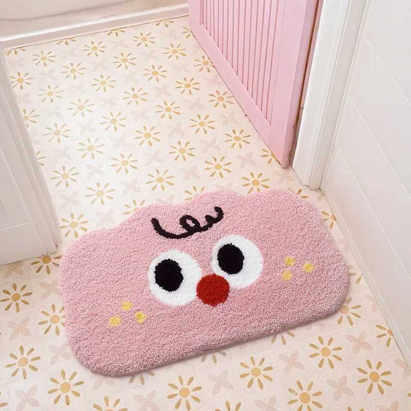 Cartoon anime patterned bathroom mat in soft colours, available in multiple sizes on a bathroom floor.