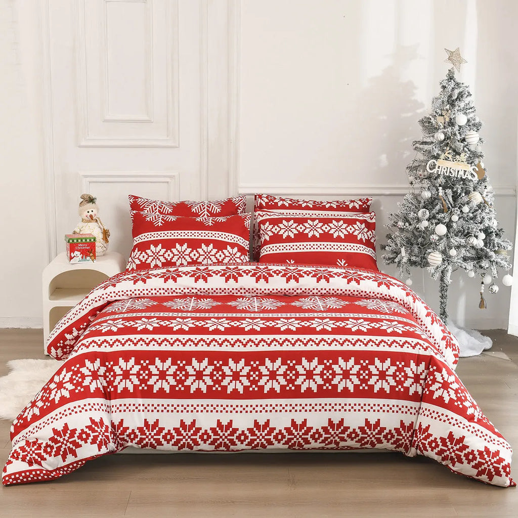 Red Christmas Love Song pattern duvet cover and pillowcases on a bed.