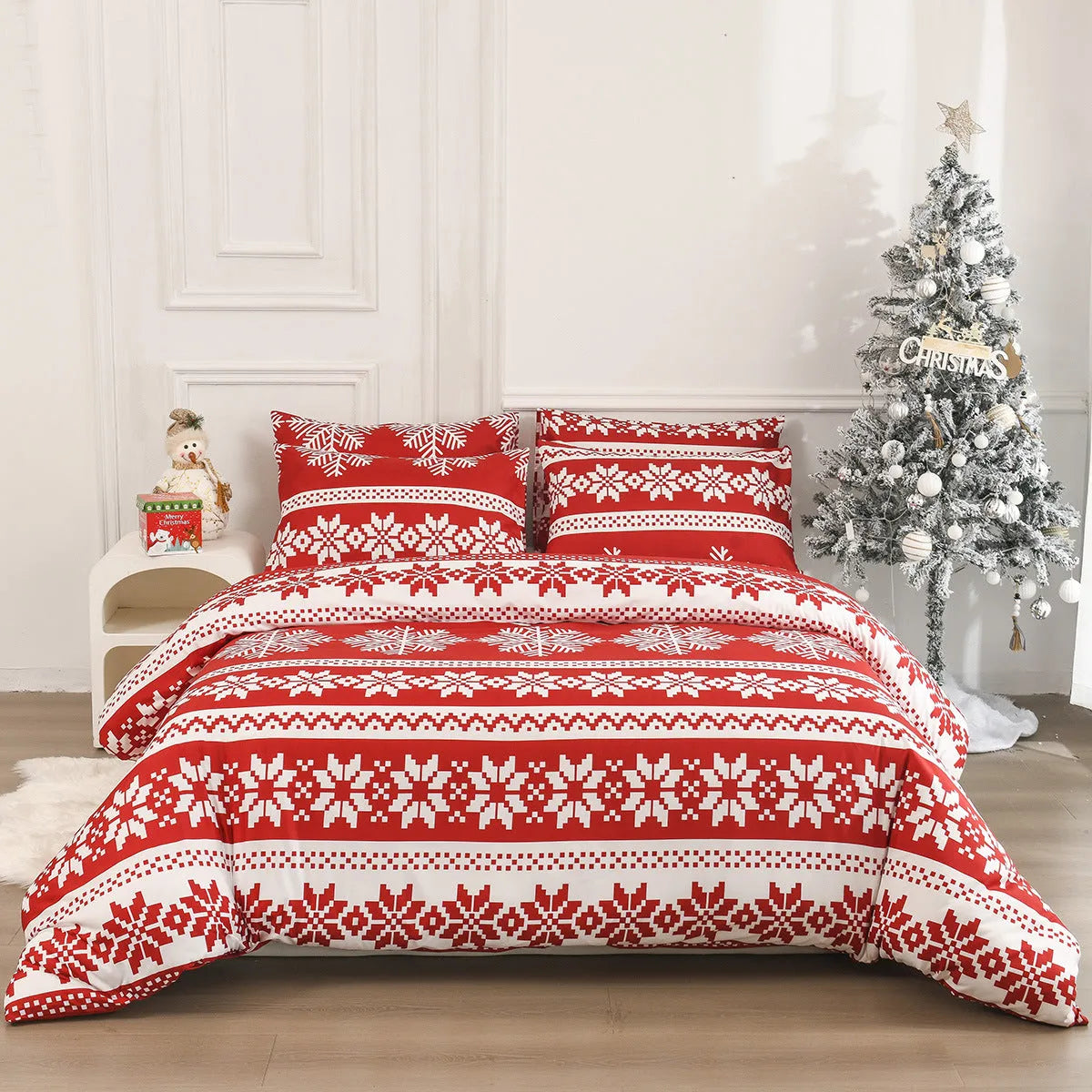 Red Christmas Love Song pattern duvet cover and pillowcases on a bed.